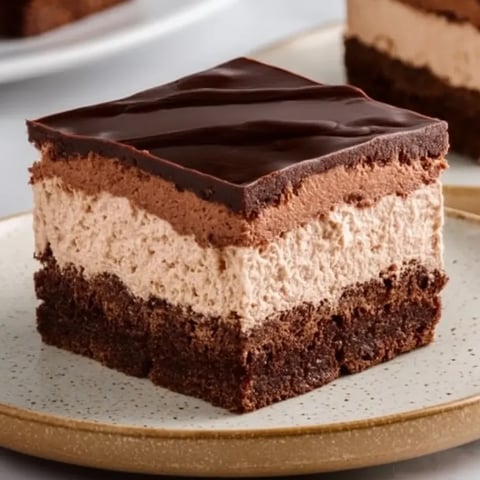 A slice of chocolate mousse brownies.